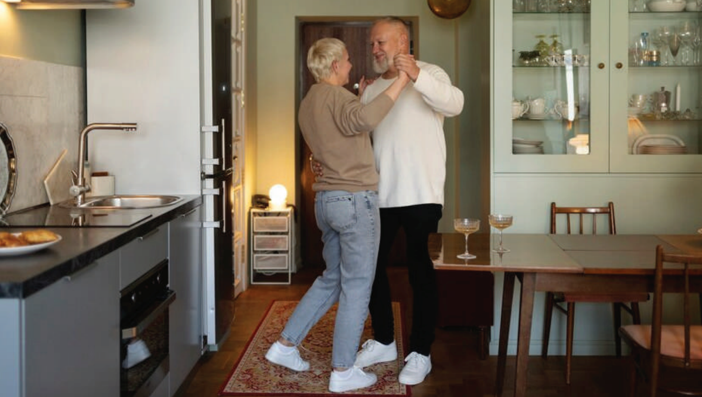 Happy couple who sold their house